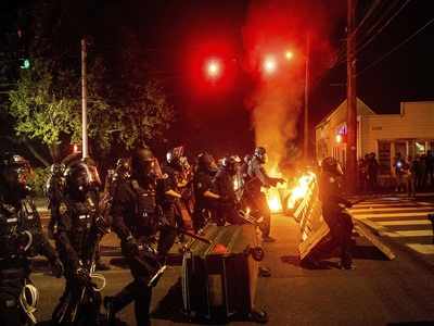 Police Use Tear Gas, Portland Protesters Throw Fire Bombs - Times Of India