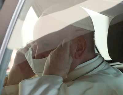 Pope Francis uses mask, sanitiser as he appeals for public health