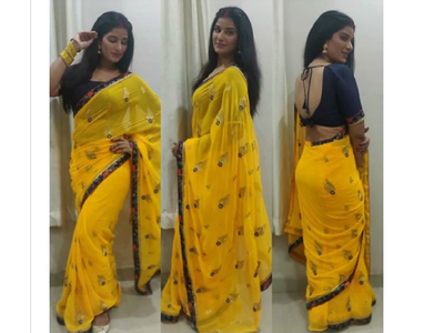 Poonam Dubey rocks the traditional glam look in a black and yellow ...