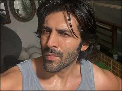 Kartik Aaryan shares his 'midnight workout' selfie and fans just can't get over his good looks