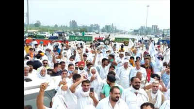 Farmers block roads in Haryana, demand rollback of three agriculture ordinances, waiving off farm loans