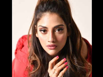 Nusrat Jahan files complaint for use of photo on dating app | Kolkata News - Times of India