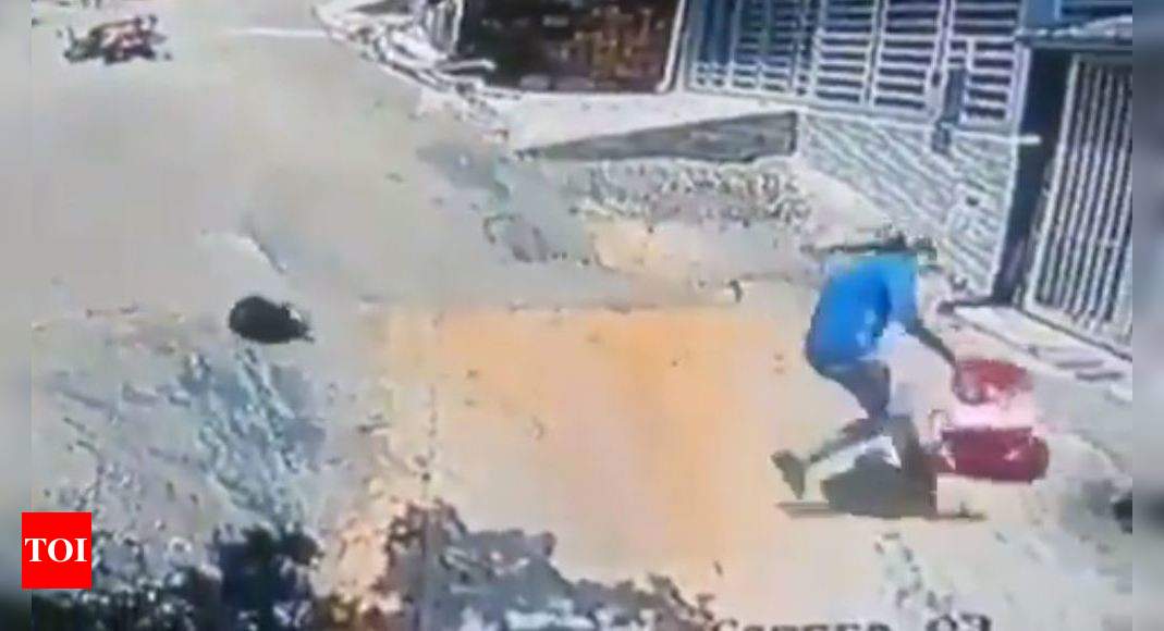 viral-video-man-jumps-off-motorcycle-saves-toddler-internet-hails-him-as-a-hero-times-of-india