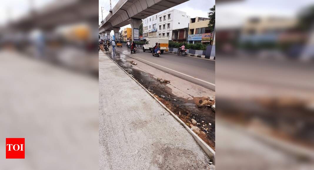 Drainage Overflow on main road - Times of India