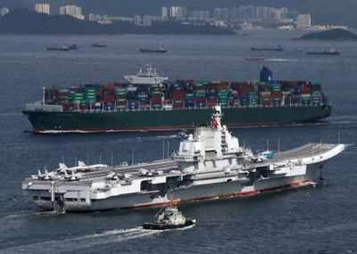 China's two aircraft carriers complete training, sea trials: Military spokesman
