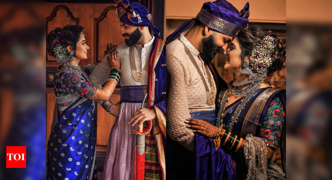 This bride wore a blue Nauvari sari 
