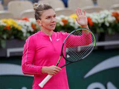 French Open: Top seed Halep beats Begu to extend winning run to 16