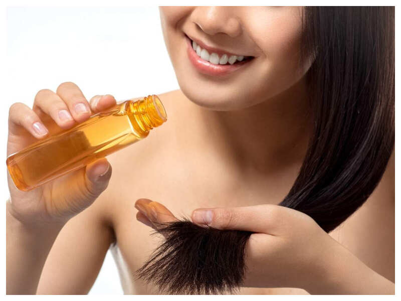 Benefits of using coconut oil in hair care regimen - Times of India