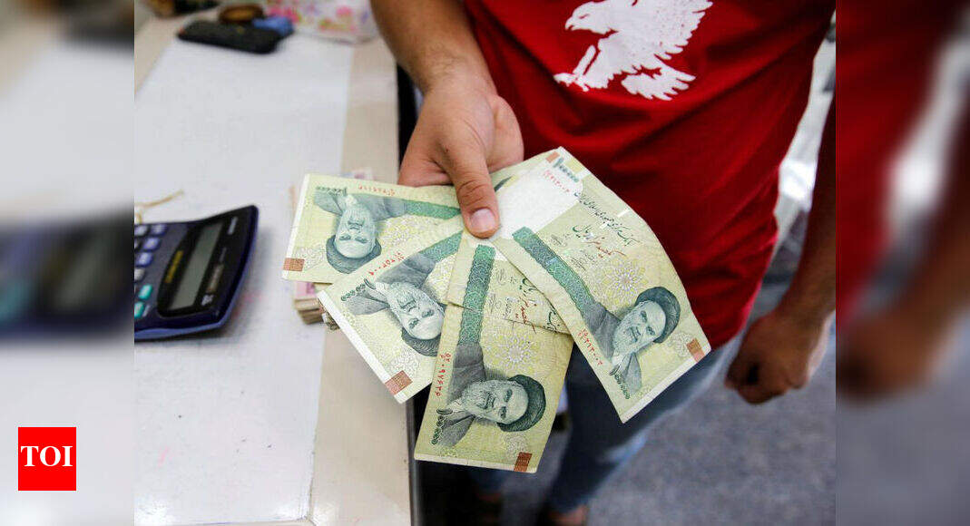 Iran's currency sees a new record low amid biting sanctions - Times of ...