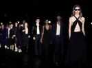 Parisian label parades models by the Seine for fashion week