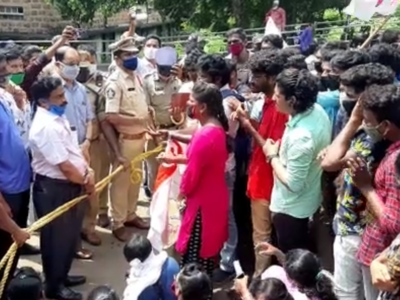 Andhra university students protest for cancellation of exams