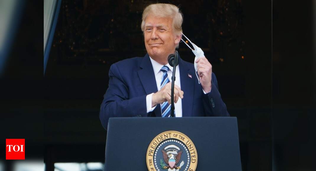 Trump tries to put Covid-19 behind him with campaign rally in Florida ...