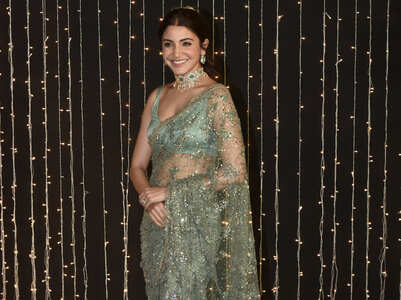5 Bollywood-inspired BLINGY saris to wear this festive season
