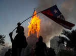 Two churches set ablaze as protests turn violent in Chile