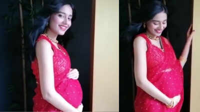 This new video of mommy-to-be Amrita Rao cradling her baby bump in red sari is too beautiful to miss!