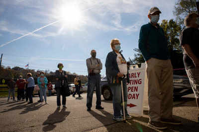 US early voting tops 60 million as historic pace continues
