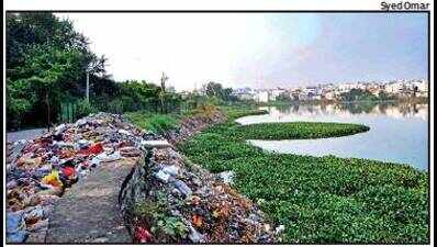 Damaged goods, hospital waste dumped at Shah Hatim Talab