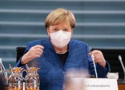 Merkel eyes tough new curbs to tame virus before Christmas