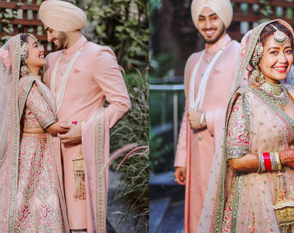 
A wedding gift so elegant! Designer Sabyasachi Mukherjee gifted Neha Kakkar and Rohanpreet Singh their gorgeous pastel pink wedding ensembles
