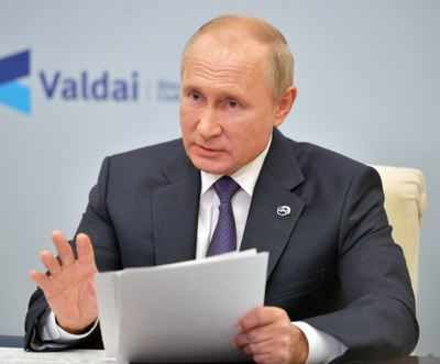 Putin says no plans for lockdown despite record cases
