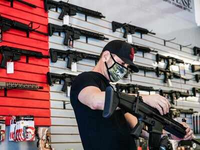 Guns and Poses: Weapon sales rocket up in US as election day nears