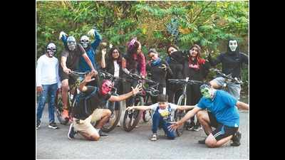 Mumbai cyclists go spooking as ghosts and witches on wheels