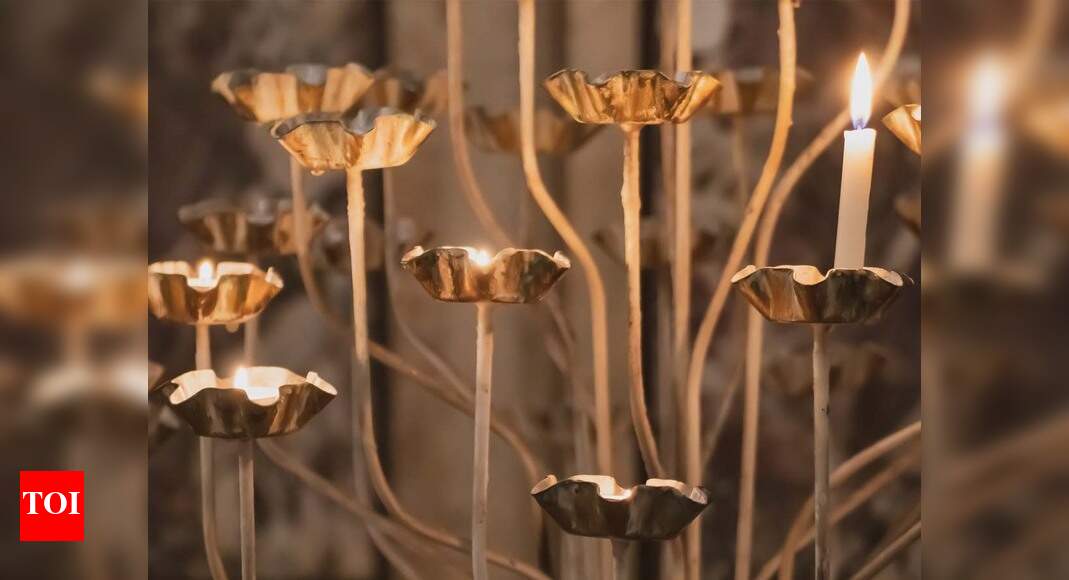 Brighten up your interiors with these candle holders for walls Most