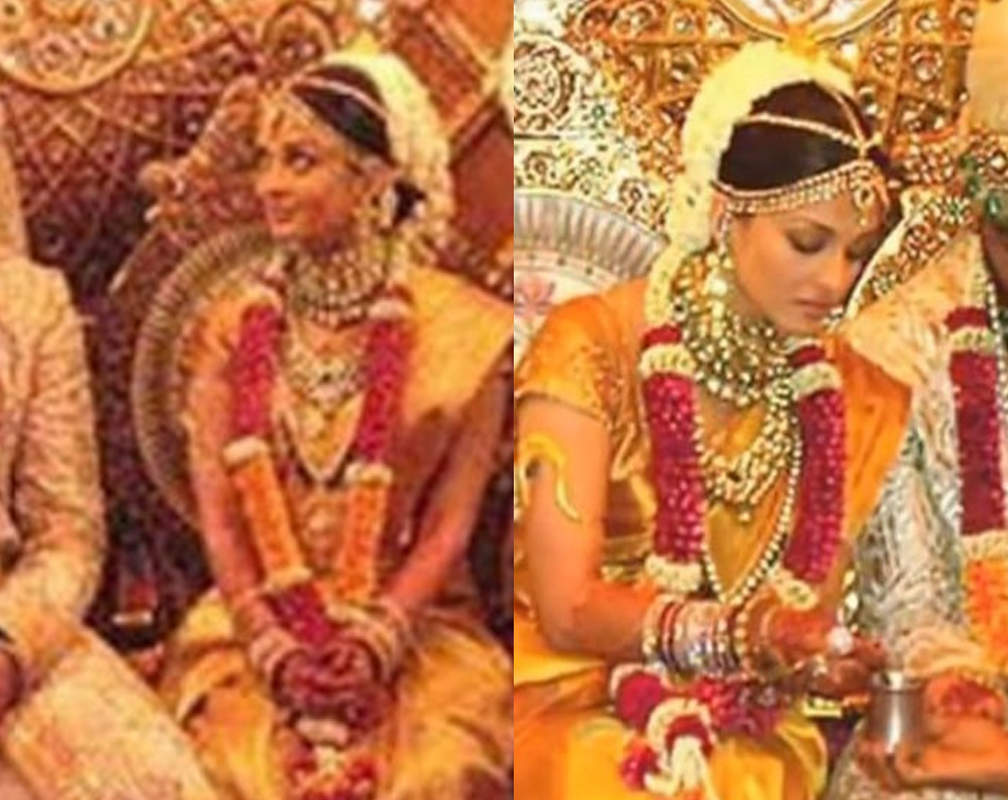 
Did you know Aishwarya Rai Bachchan's wedding sari had real gold thread work with Swarovski crystal? Here is how much it costed!
