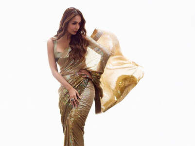Malaika Arora flaunts her curves in a hot bodycon sari