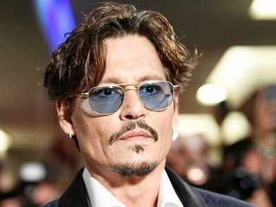 Johnny Depp reveals he has been asked to resign by Warner Bros from 'Fantastic Beasts'; adds, "I have agreed to that request"