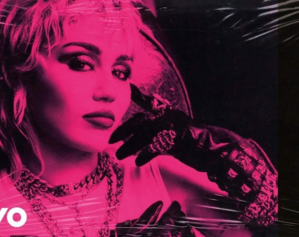
Listen To Latest English Official Music Audio Song 'Edge Of Midnight' (Remix) Sung By Miley Cyrus Featuring Stevie Nicks
