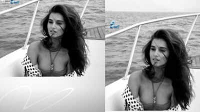 This monochrome picture of Tara Sutaria 'riding the waves' on a boat will drive away your Monday blues!
