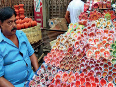 Kolkata: Sellers shift focus from crackers to diyas, candles