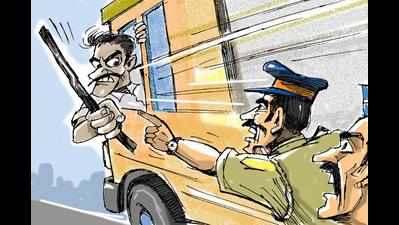 Gujarat: Cop hangs on to runaway van’s bonnet for 20 km