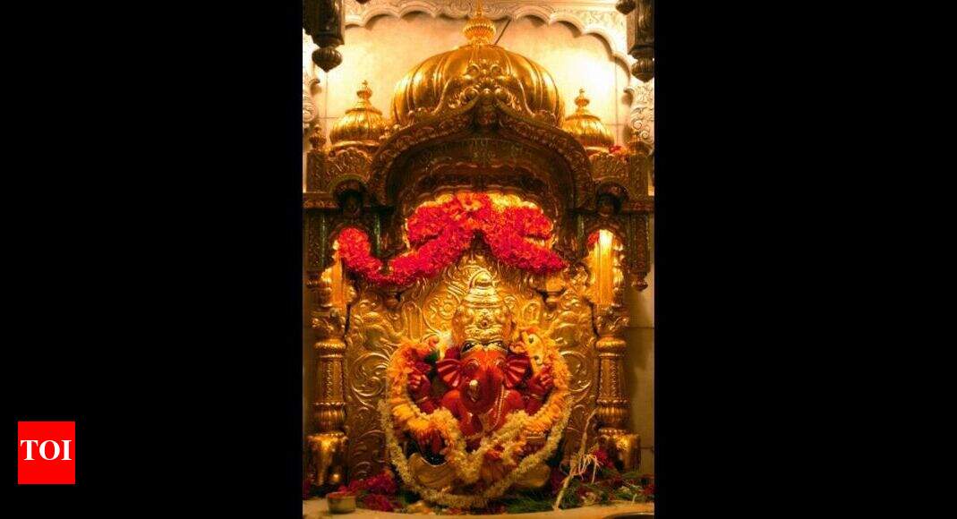 Post-Covid guidelines firmly in place as temple doors set to open in Maharashtra on Monday - Times of India