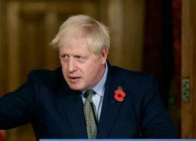 Boris Johnson in quarantine but declares himself fit, working