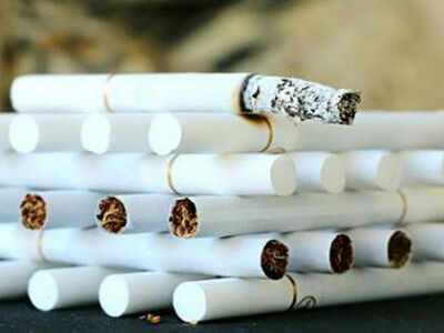 cigarettes in mouth meme Young Man With Many Cigarettes In His Mouth On Gray Background Stock Photo,  Picture and Royalty Free Image. Image 27922665
