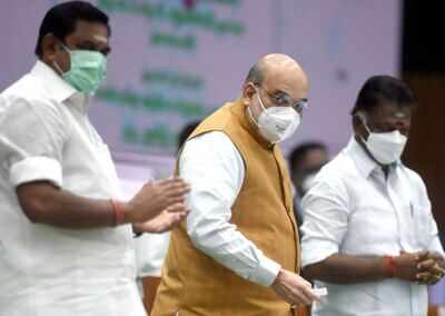 Union home minister Amit Shah with Tamil Nadu CM K Palaniswami and Dy CM O Panneerselvam during an event in Chennai BJP-AIADMK tie-up to continue for 2021 Tamil Nadu polls | India News - Times of India