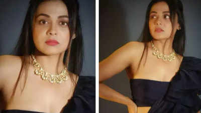 Actress Prarthana Behere looks stunning in black ruffled saree