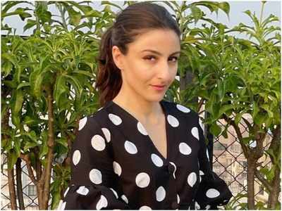 Soha Ali Khan keeps it stylish in a polka dotted dress