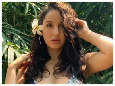Nora Fatehi shares a throwback picture from her vacation: Take me back to the beach..where I belong