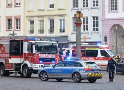Police secures the area nearby the scene where a car drove into pedestrians in Trier, southwestern Germany (AFP)