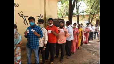 GHMC elections: Sanitation, distancing norms flouted at polling stations
