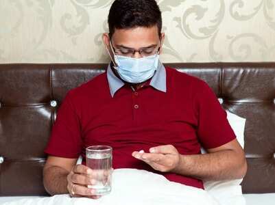 Can the isolation period be shorter than 14 days for people with COVID-19?