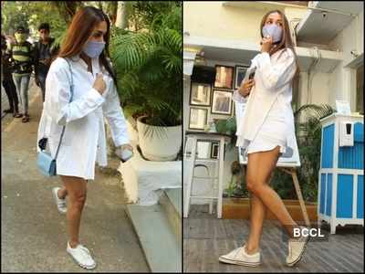 Malaika Arora looks mesmerising in white as she steps out for Sunday lunch in the city - view photos