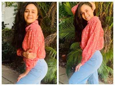 Amruta Khanvilkar looks stunning in a casual outfit as she strikes a pose for the camera