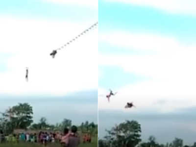 Boy flies away with kite, onlookers watch with horror