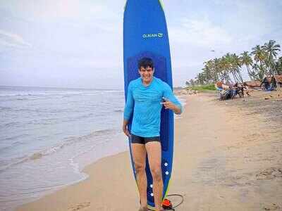 Sudev Nair goes surfing in Varkala