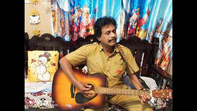 Bengaluru: Postman by day, vocal guitarist by night