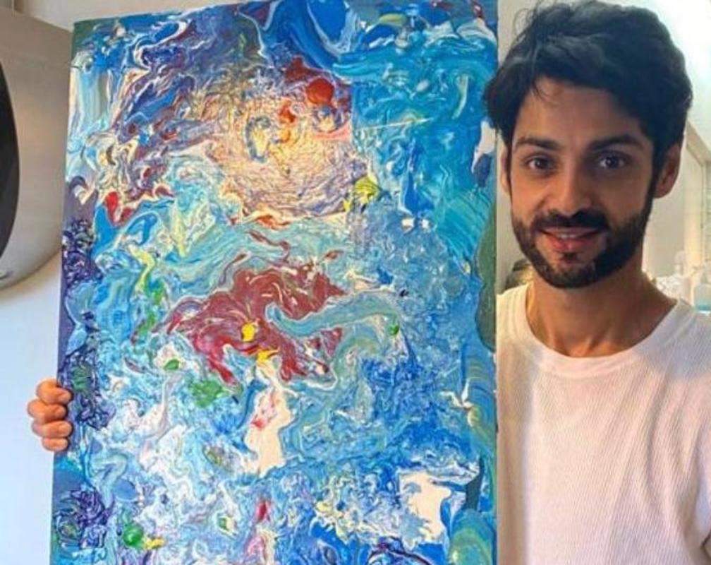 
Bollywood actor Karan Wahi paints on canvas to create a cryptograph for a cause
